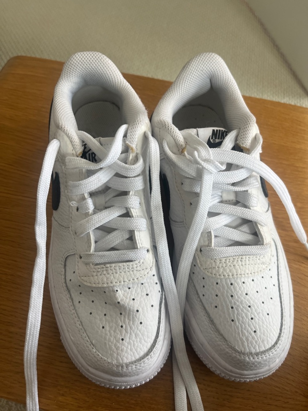 Nike Air Force Kids White Sneakers with Black Swoosh